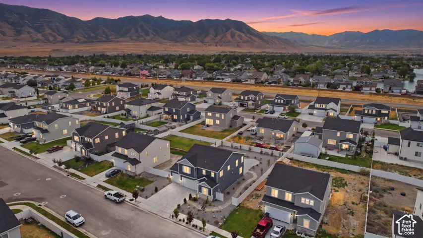 Contemporary residential development featuring a collection of homes with diverse exterior finishes