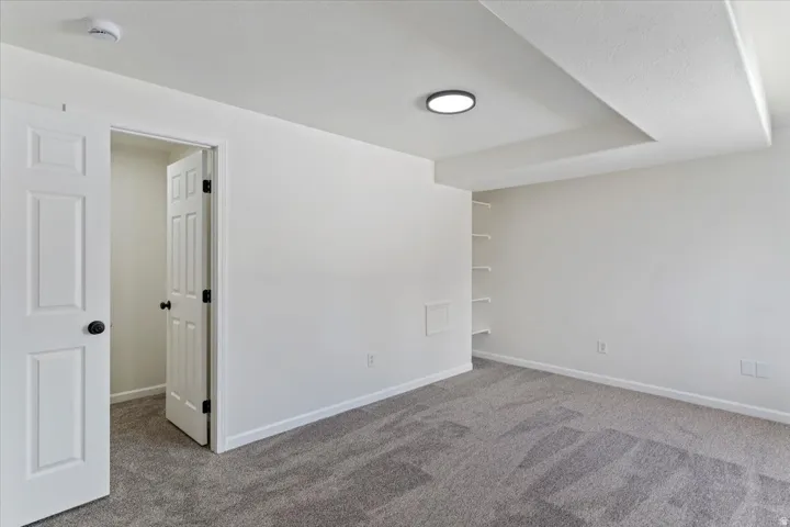 Neutral color palette with textured gray carpeting