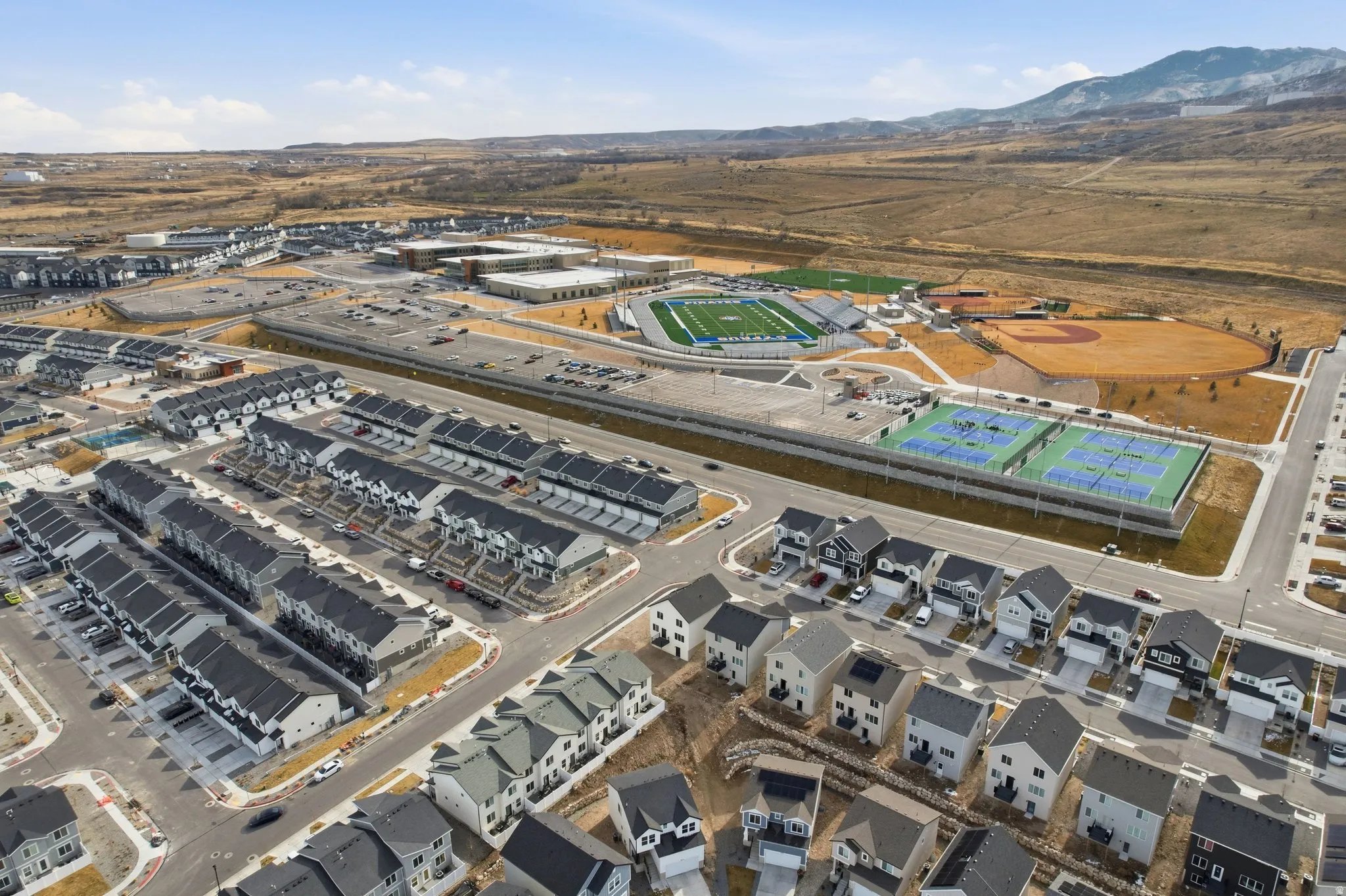 Aerial perspective showcasing a residential community with varied housing styles