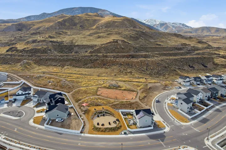 Aerial perspective highlighting a residential development with a mountain backdrop