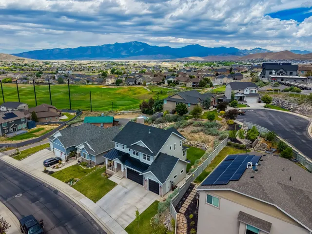 Residential neighborhood featuring a prominent mountain backdrop