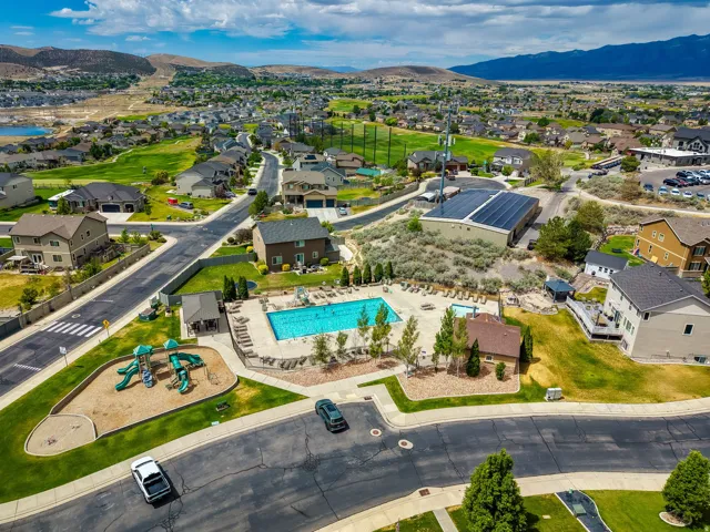 Expansive aerial capturing a neighborhood with varied residential architecture