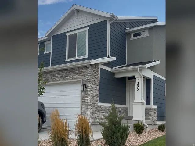Contemporary two-story residence with a two-car garage