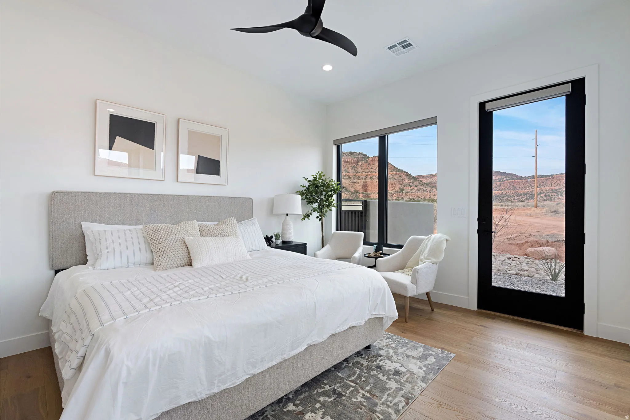 Bright interior space with wood-finish flooring