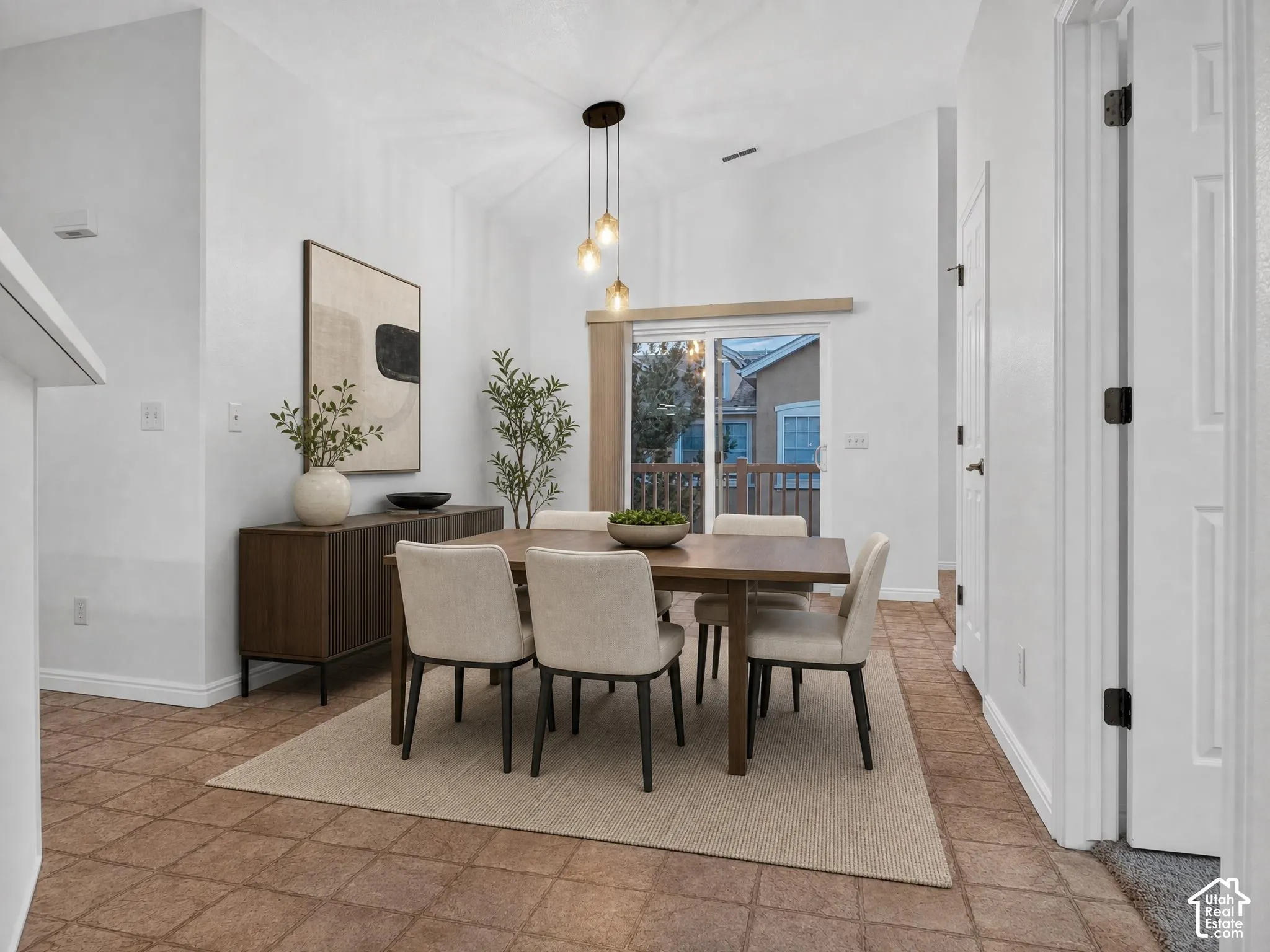 Vaulted ceiling with a contemporary pendant light fixture