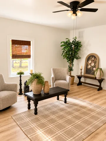 Recessed lighting, wood-finish flooring, white trim, and a ceiling fan with integrated lighting