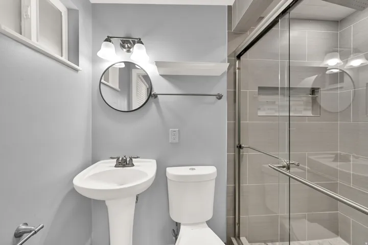 Pedestal sink with dual-handle faucet