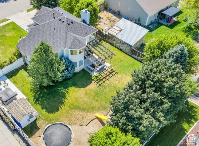 With mature trees, an in-ground trampoline, playground, Sundance original ski shed and hot tub!