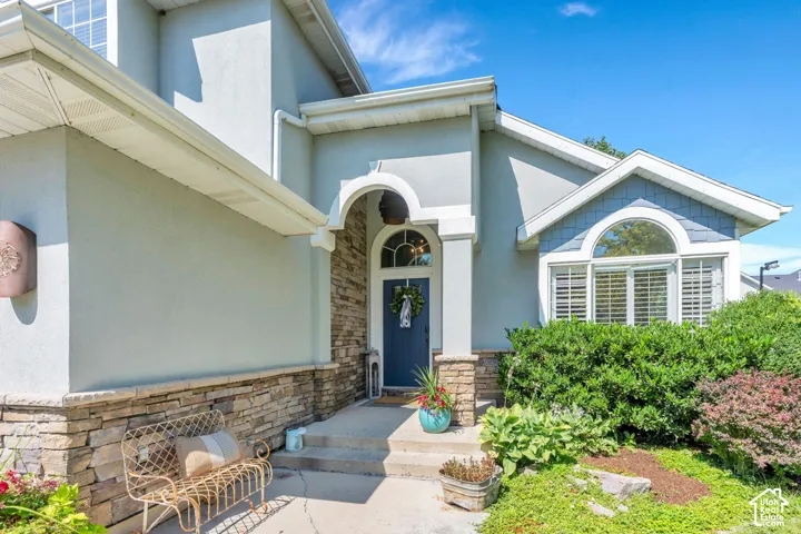 Stucco exterior with stone veneer accents