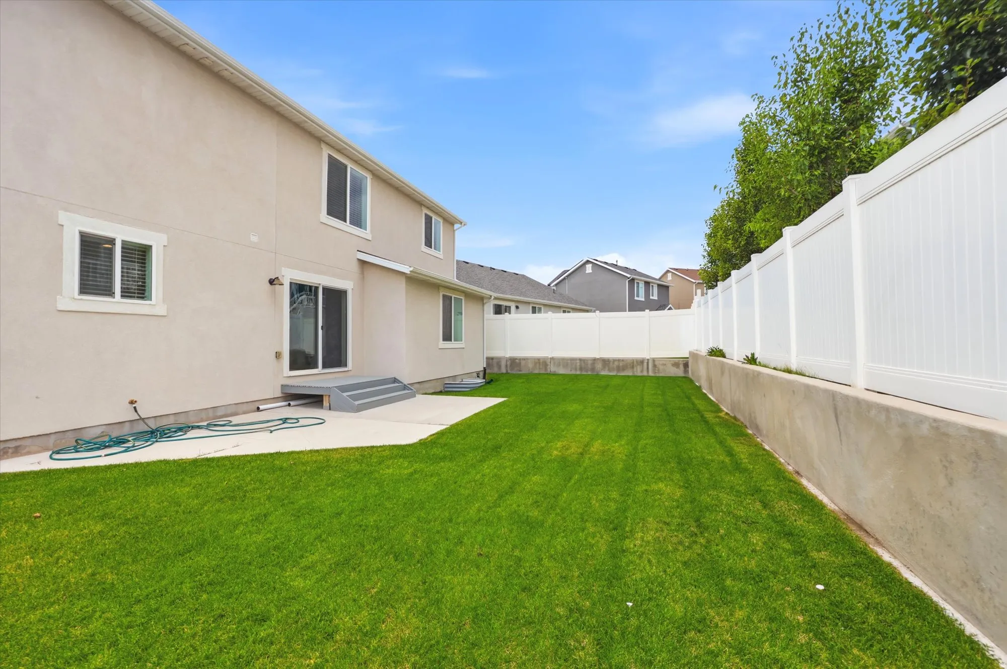 Expansive green lawn providing outdoor space