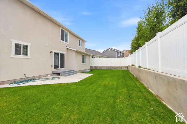 Expansive green lawn providing outdoor space