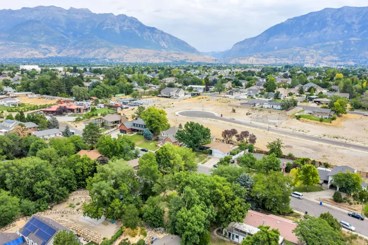 Expansive aerial perspective showcasing a residential area with varied housing styles