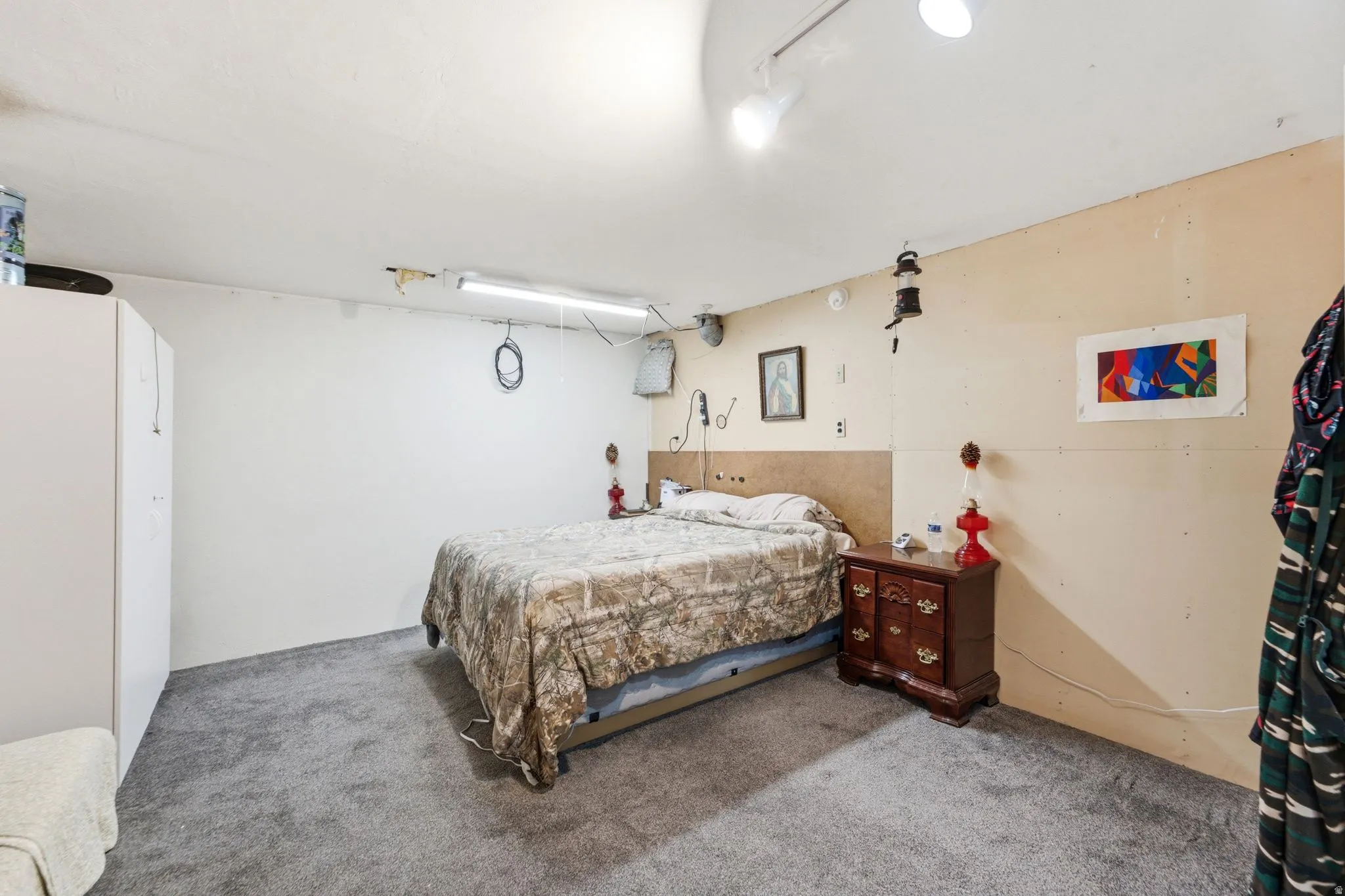 Carpeted flooring extending through the space