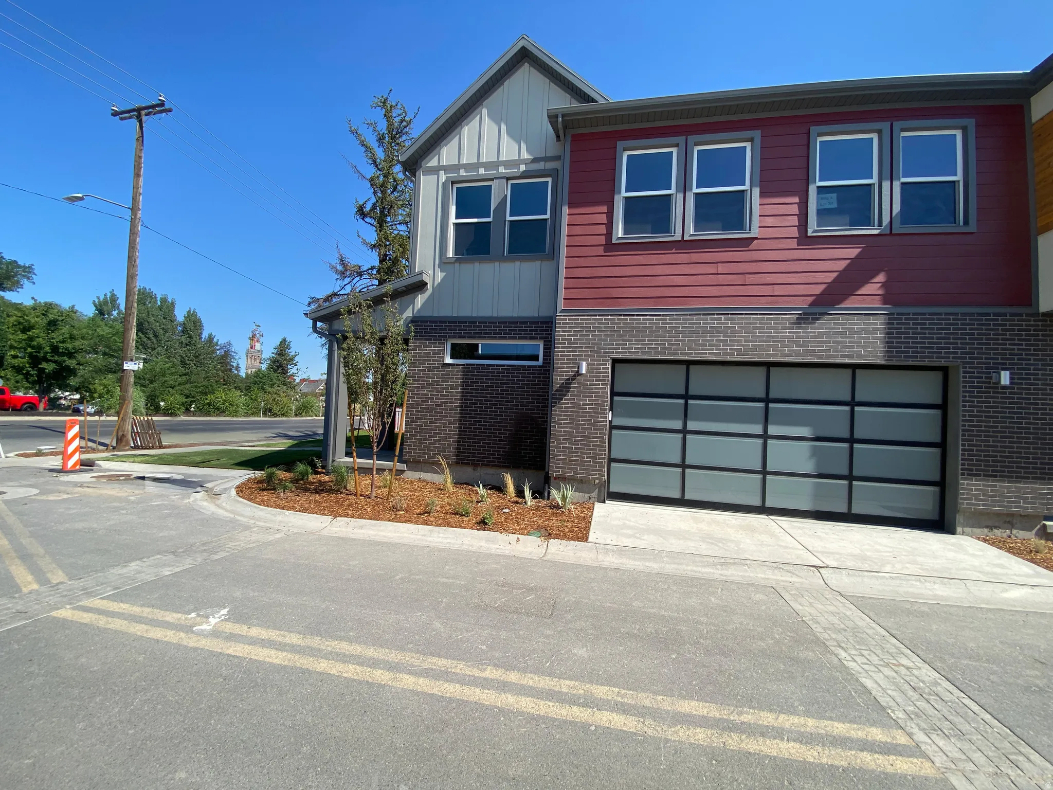 So many windows! End home and 2 car garage. A rare find in the city