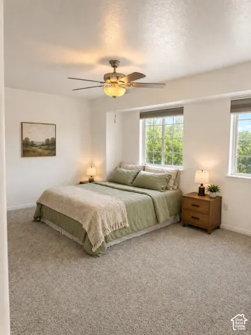 Primary bedroom.  Furniture digitally added.