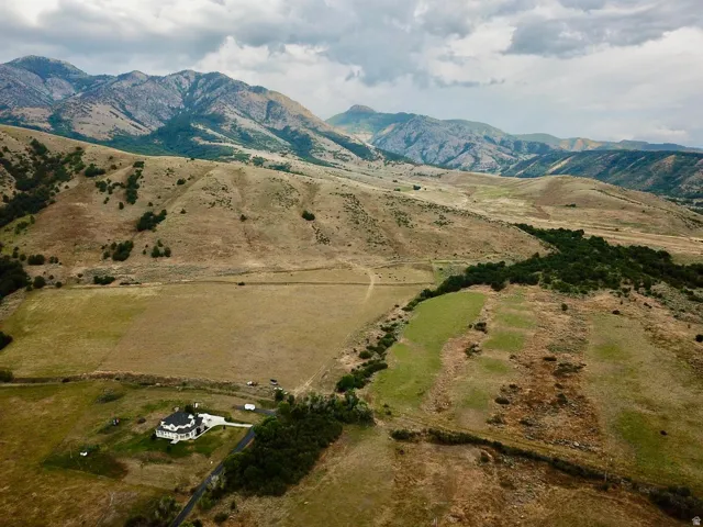 Expansive mountainous landscape with a large parcel of land