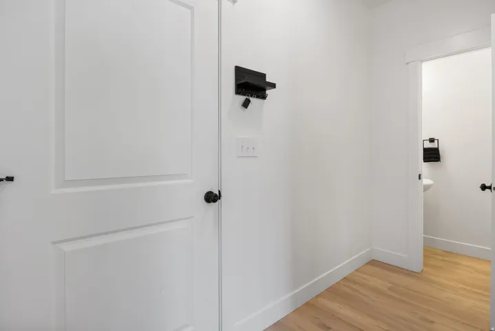 White paneled interior doors with matte black hardware