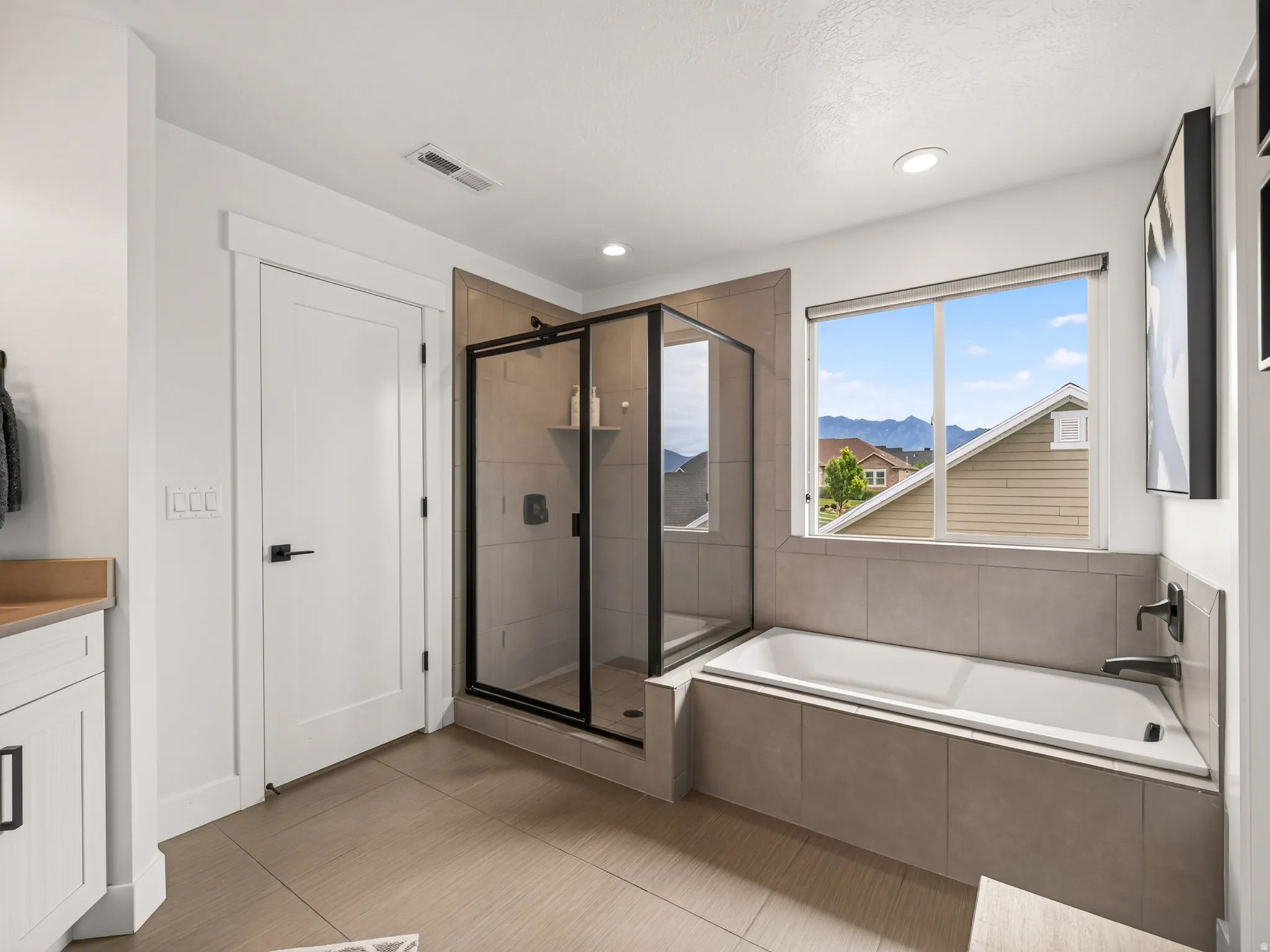 Walk-in shower with separate tub