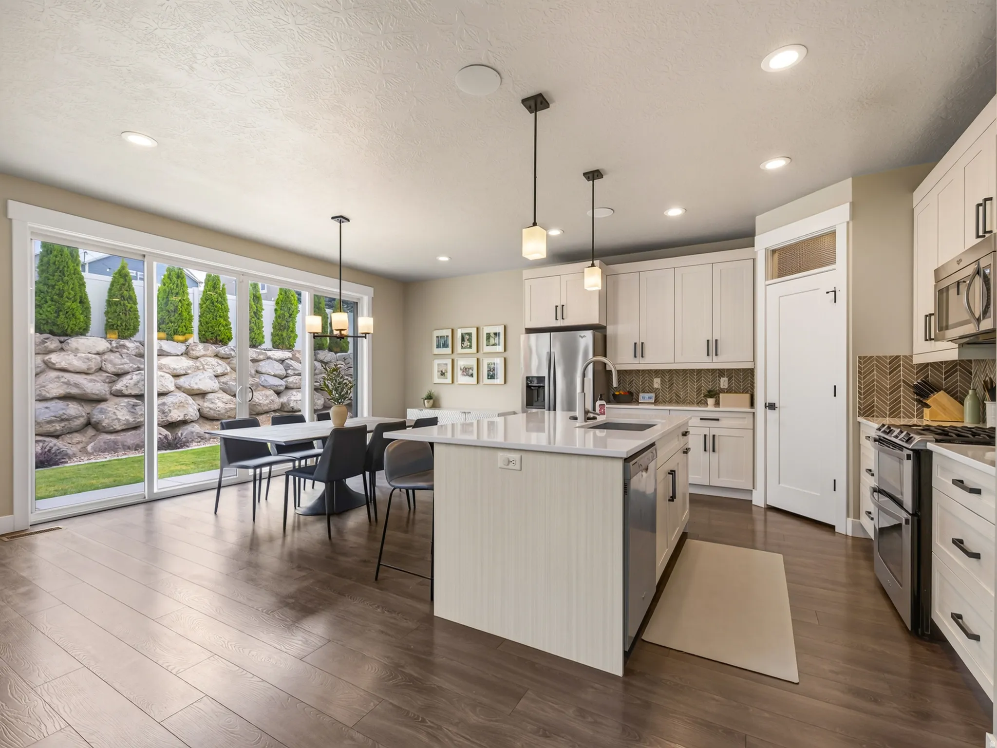 Large kitchen/dining area with access to back yard