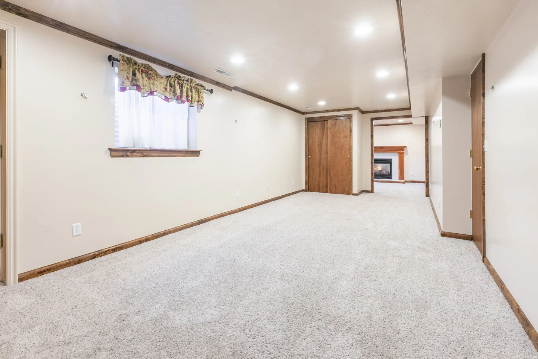Spacious family room with bonus room and fireplace.