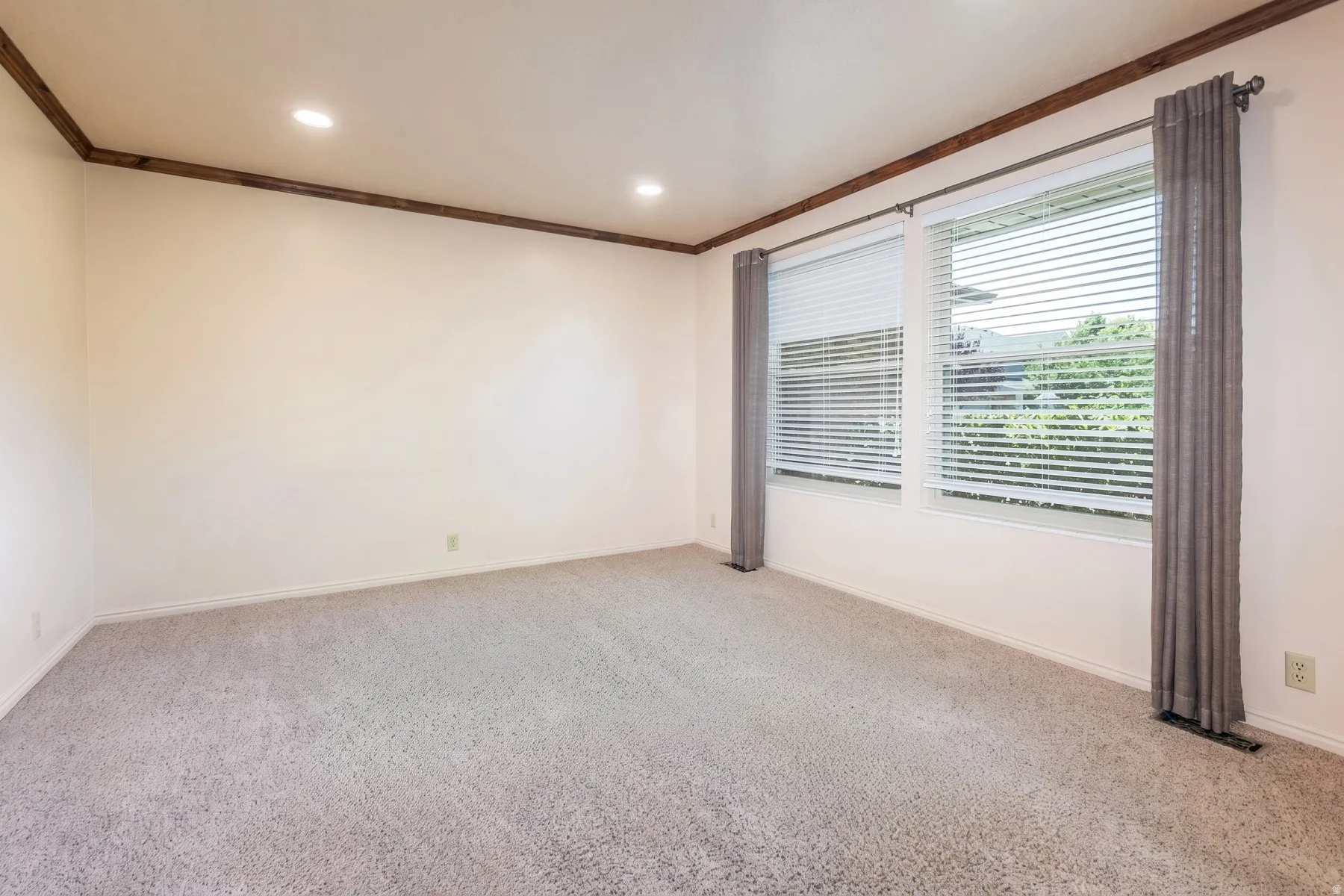 Formal living room / Office. Lots of natural light with newer windows!