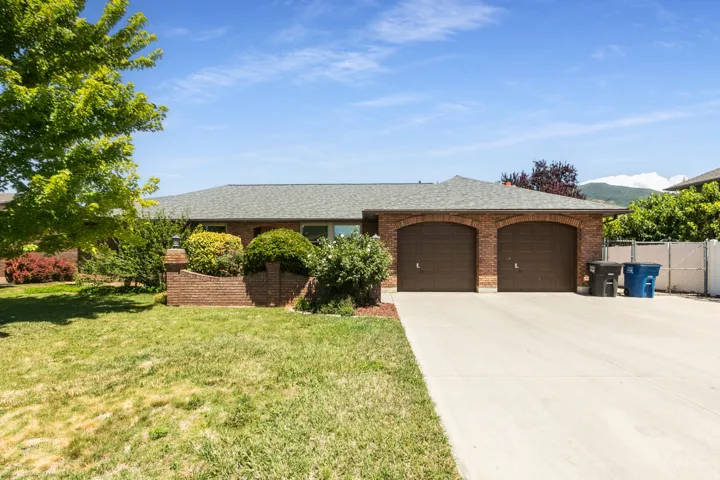 All brick, west facing rambler!  This home features a whole home natural has generator with 100 gallon back up propane tank!