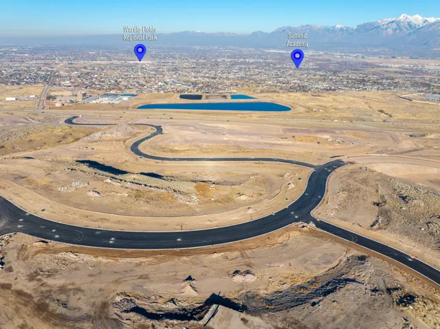 Aerial perspective showcasing a developing residential area with newly paved roads