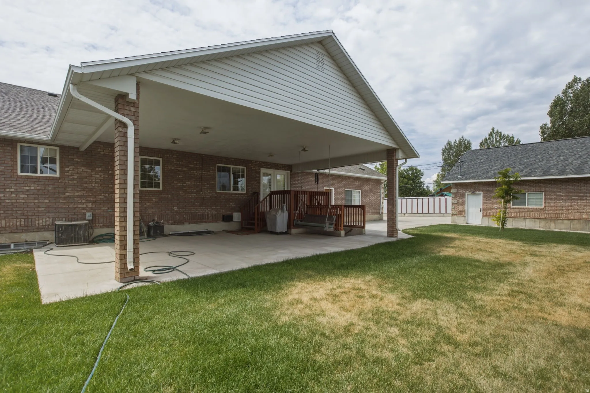 Covered patio featuring a concrete slab and direct access to the interior