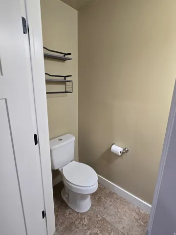 Tile flooring and wall-mounted shelving