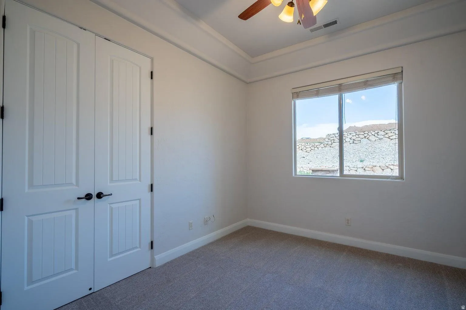 Neutral tone wall finishes with coordinating baseboards