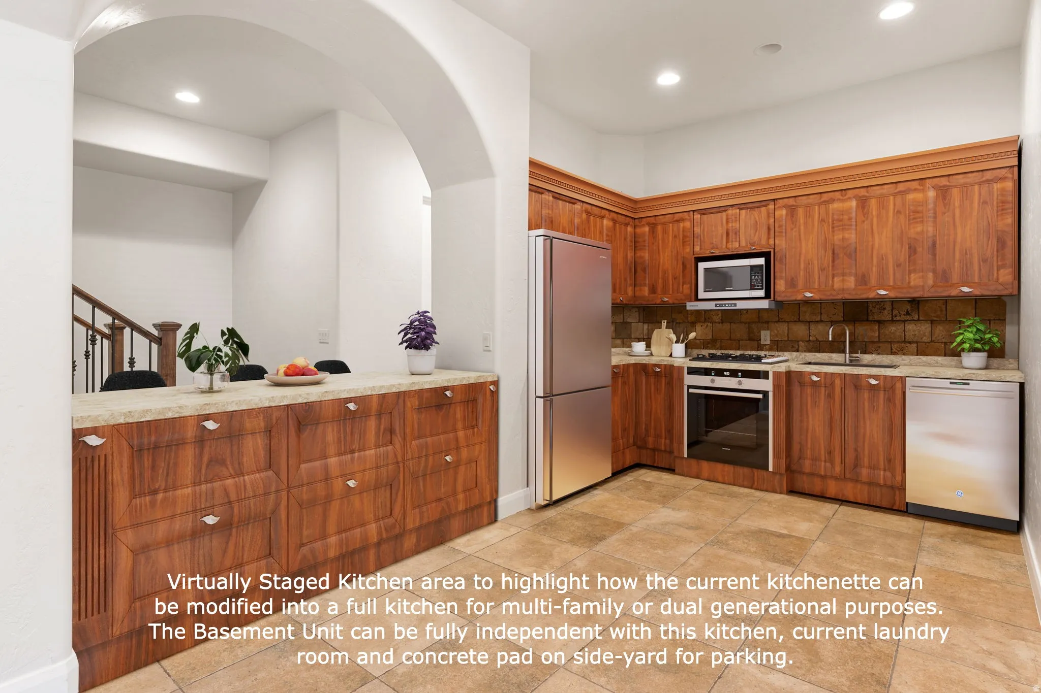 Kitchenette featuring wood-finish cabinetry, light-toned countertop, and stainless steel appliances including a refrigerator, microwave, oven, and dishwasher