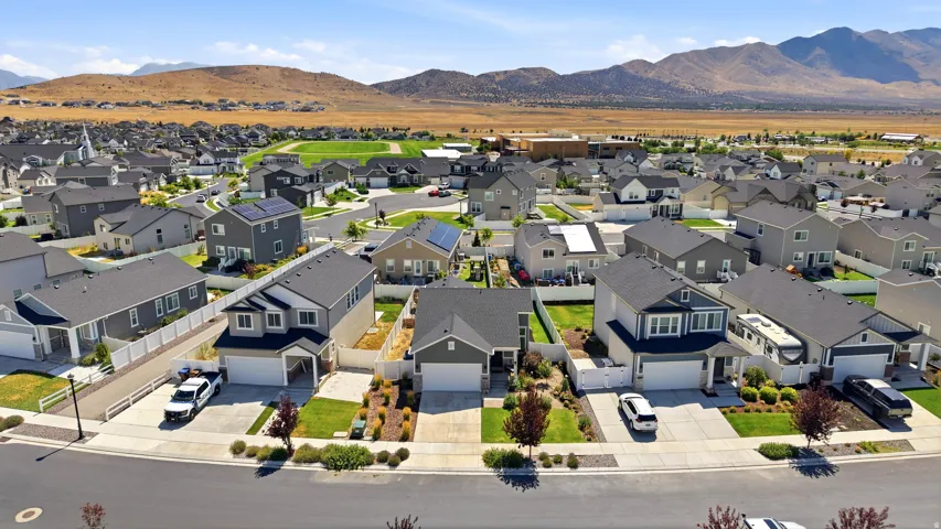 Aerial perspective showcasing a developed residential community with consistent architectural styling