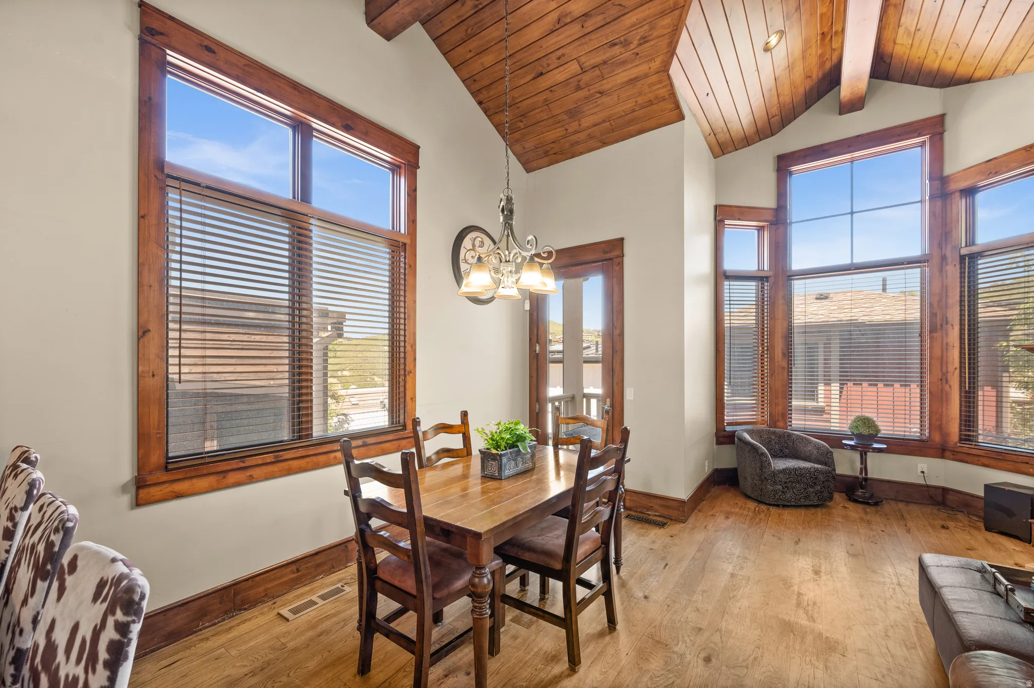 Vaulted wood-paneled ceiling with exposed beams