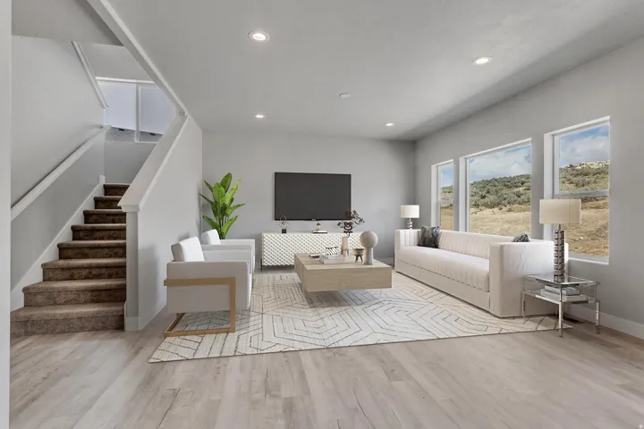 Bright living area with light wood-finish flooring