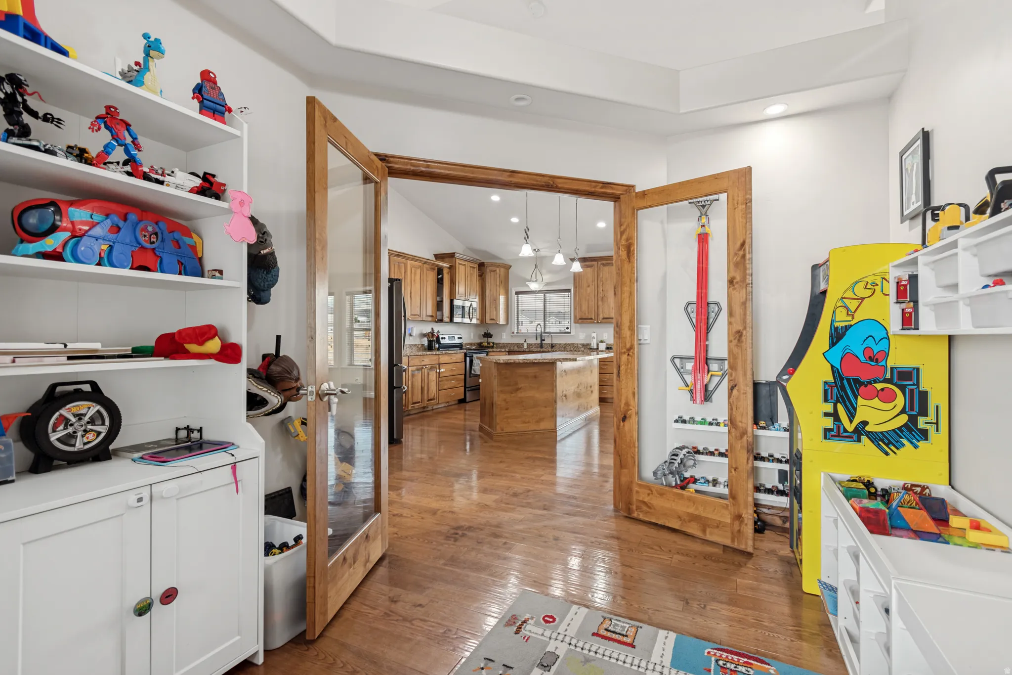 Interior space featuring wood-finish flooring and a tray ceiling