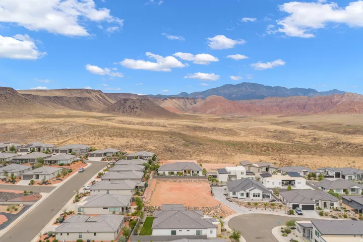 Residential development featuring varied architectural styles and a cul-de-sac street design