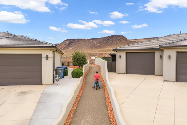 Concrete driveways with integrated pedestrian path
