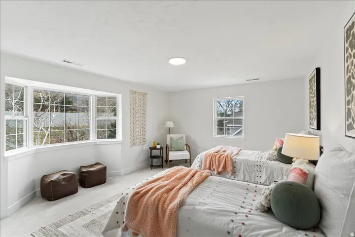 Bright room with a prominent bay window featuring multiple panes
