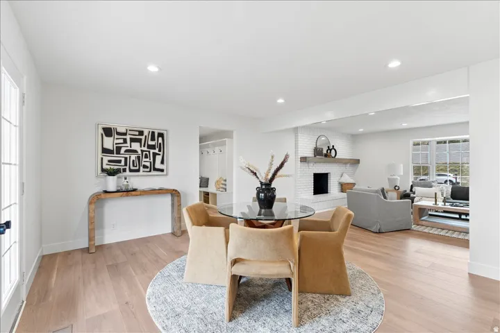 Light wood-finish flooring throughout the space