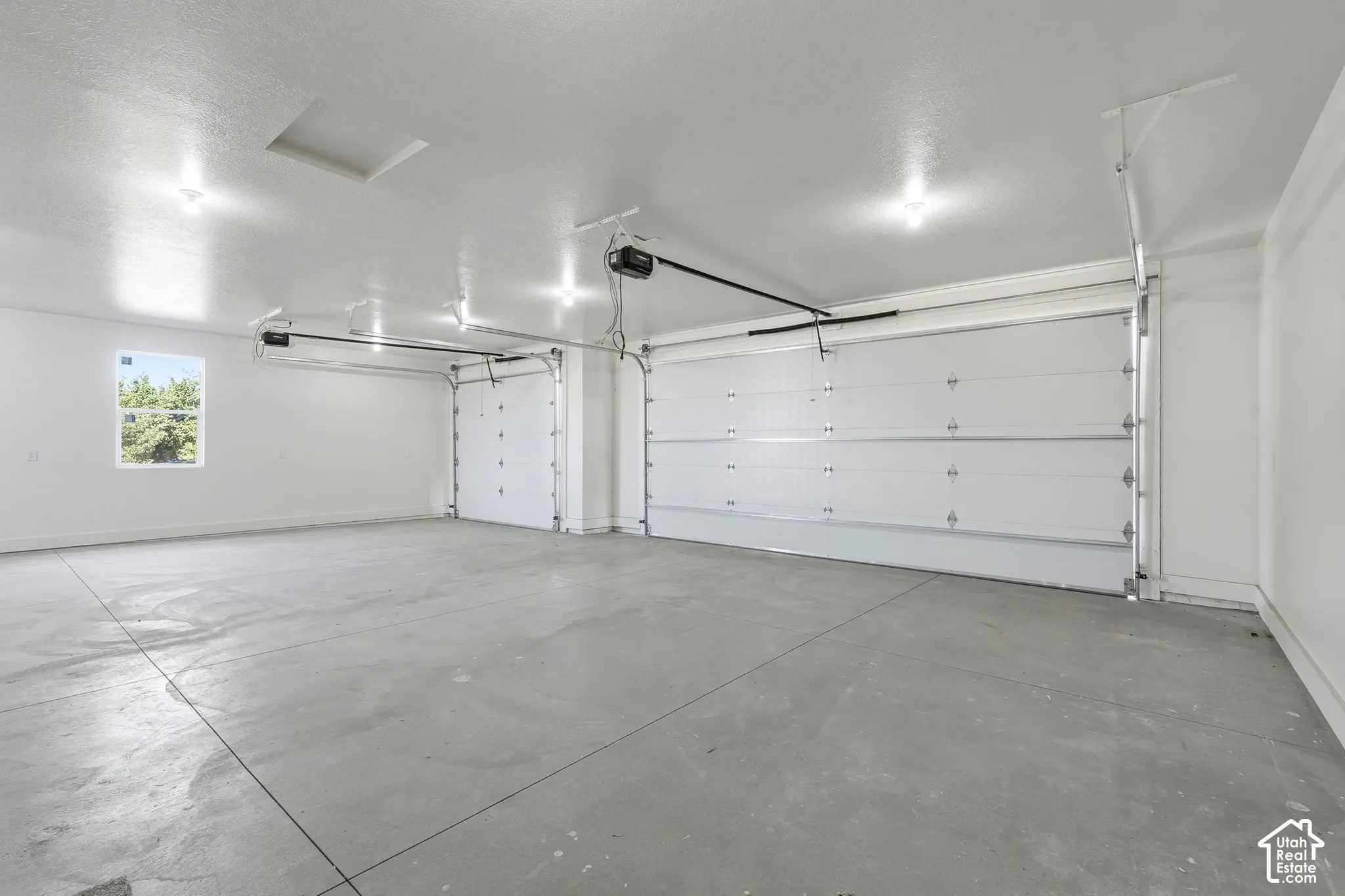 Two garage doors with automatic openers