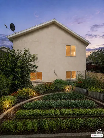 Exterior stucco siding with visible windows