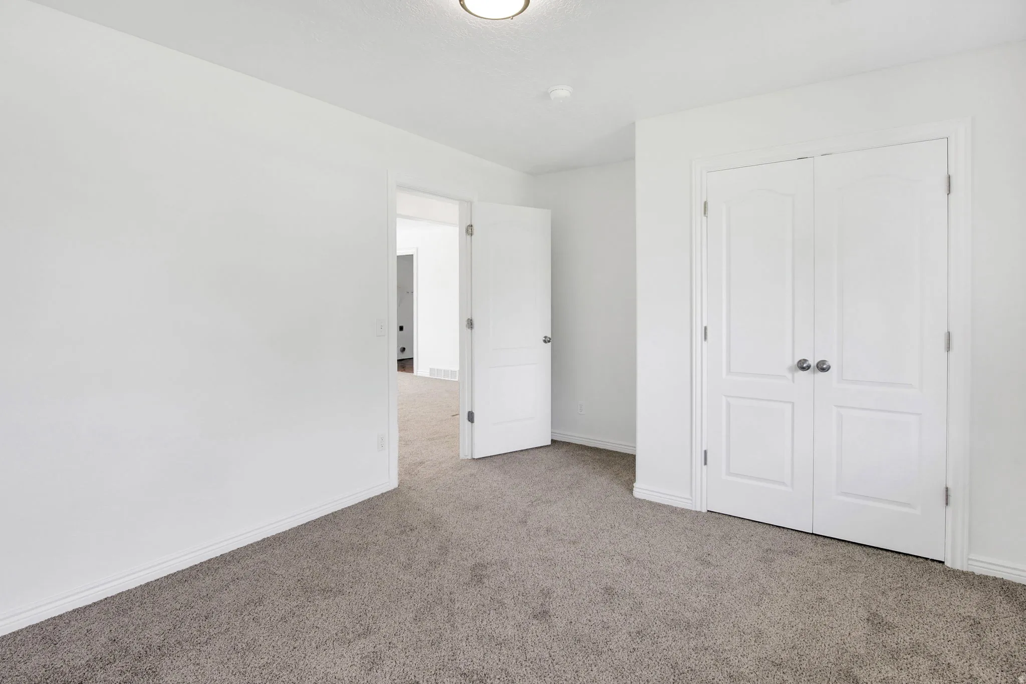 Neutral white walls throughout