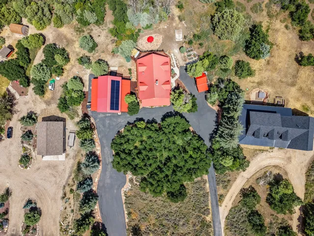 Aerial perspective showcasing multiple structures and expansive grounds