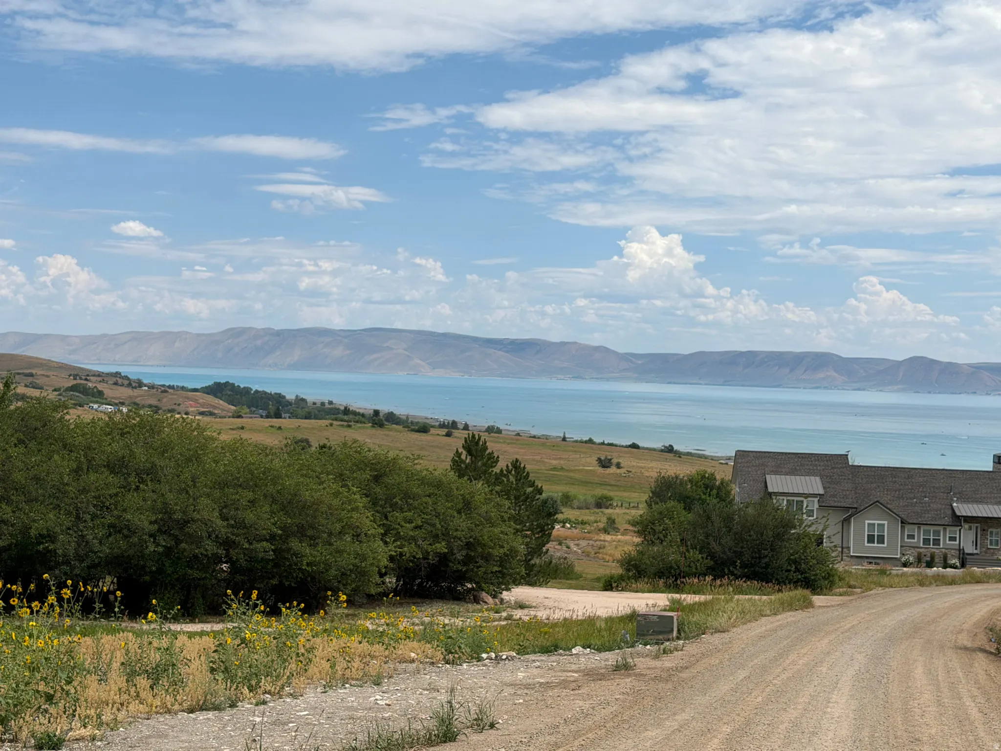 Expansive water scenery framed by distant mountains