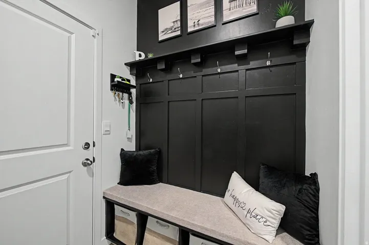 Built-in mudroom bench with integrated storage cubbies