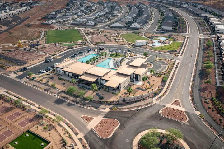 Aerial depiction of a residential community featuring a central amenity complex