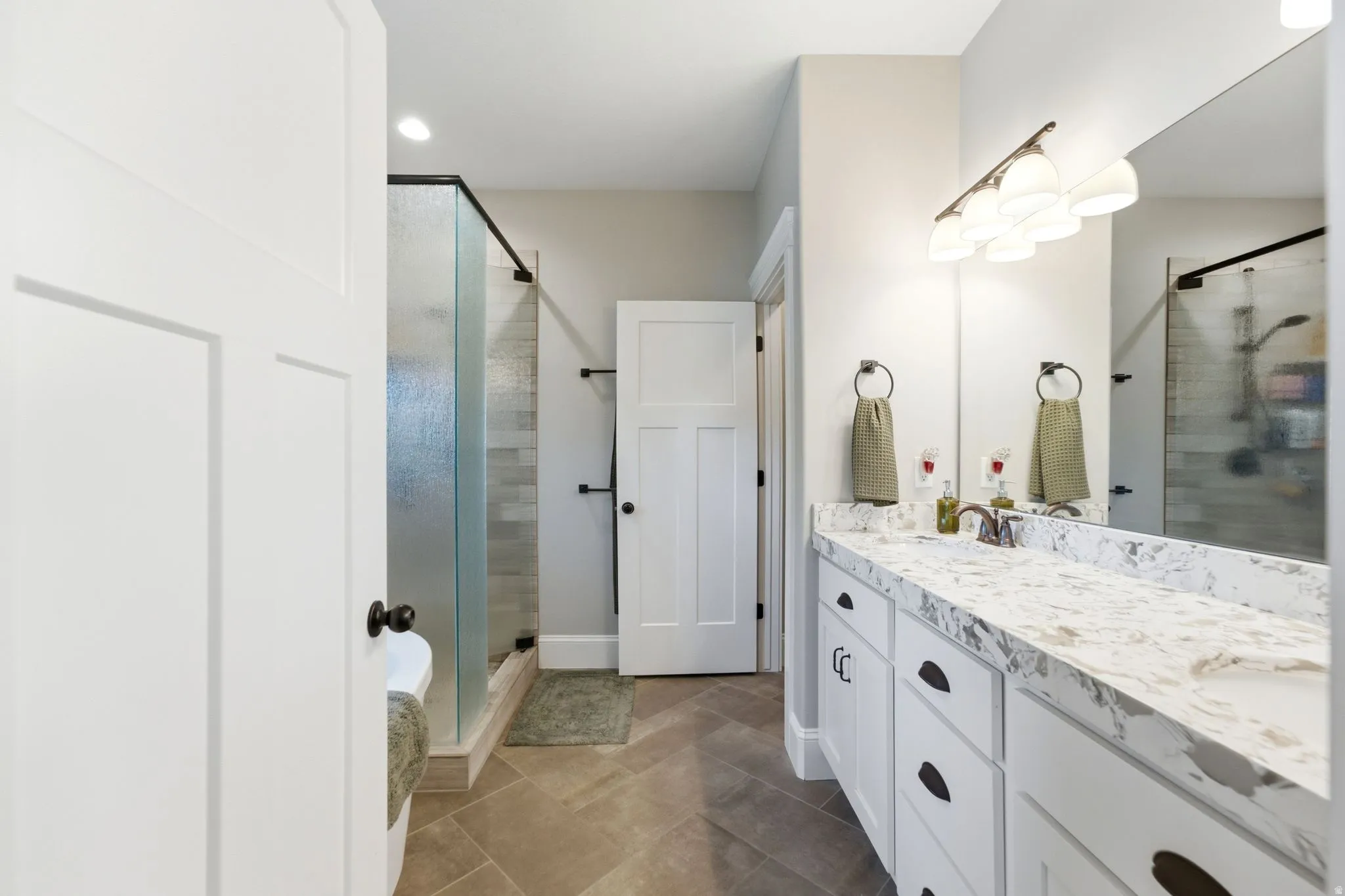 Primary en-suite featuring double sinks
