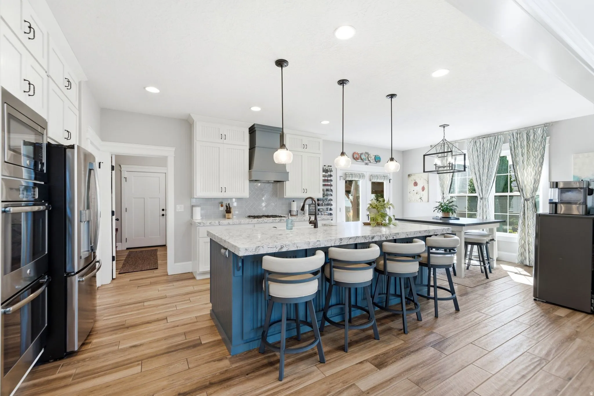 Kitchen with view of mud-room/laundry room
