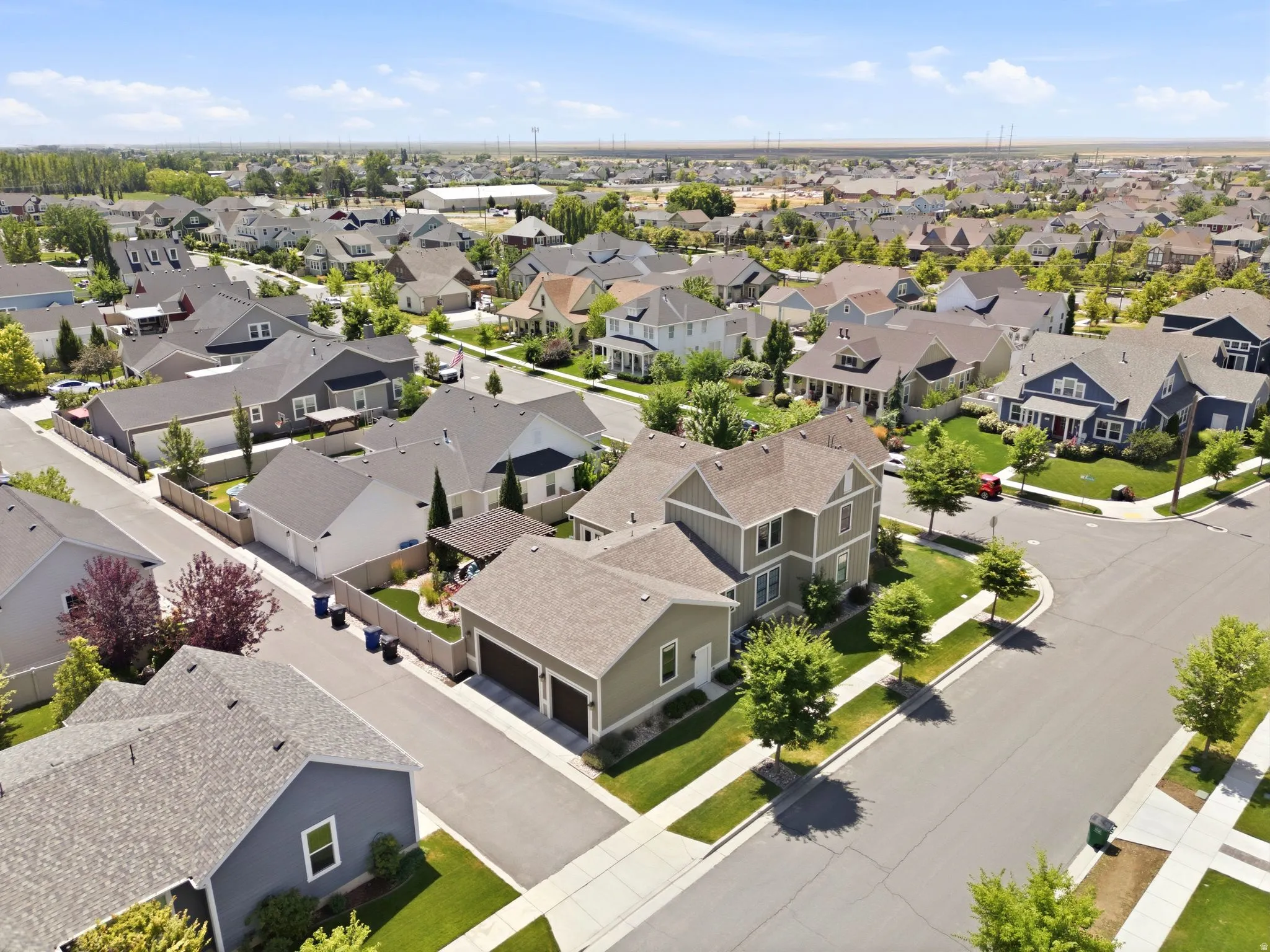Residential neighborhood with varied architectural styles and well manicured landscaping