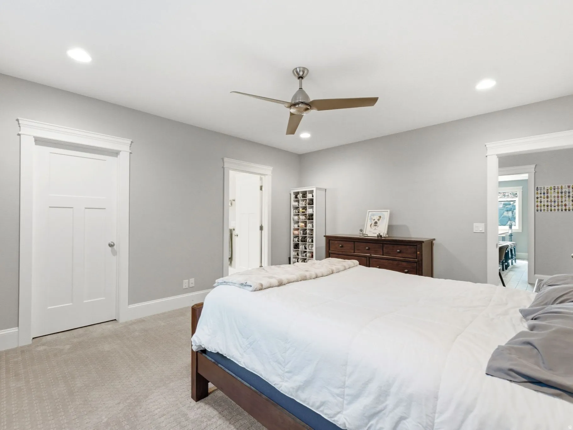 Lower level bedroom 4 featuring walk-in closet and en-suite bathroom